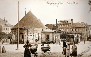 Exposition de photographies sur l'histoire du Puits de Siège